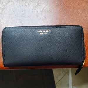 Kate Spade New York Black Continental wallet with zip-around closure